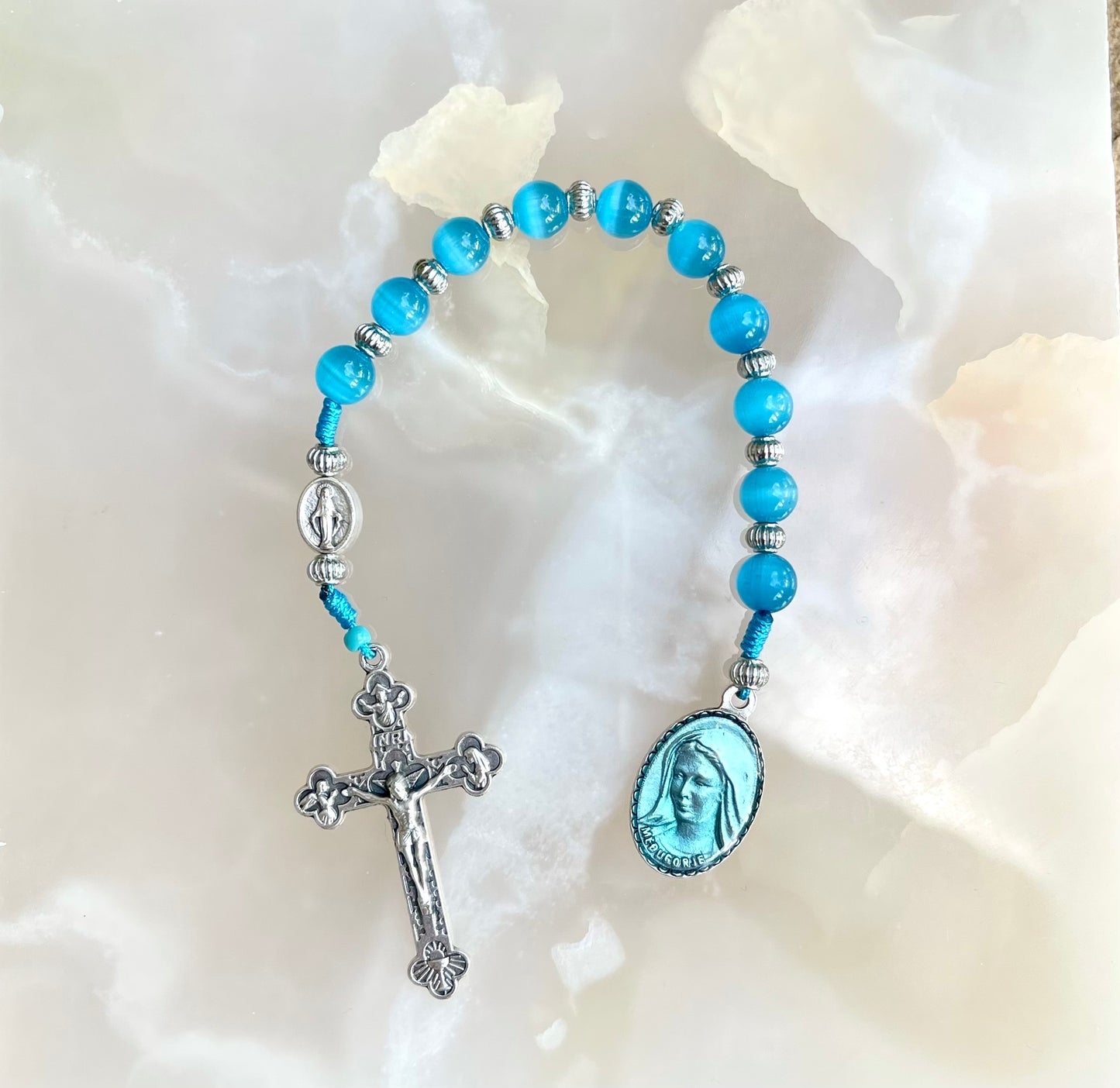 Queen Of Peace Light Blue Semi Precious Pocket Rosary